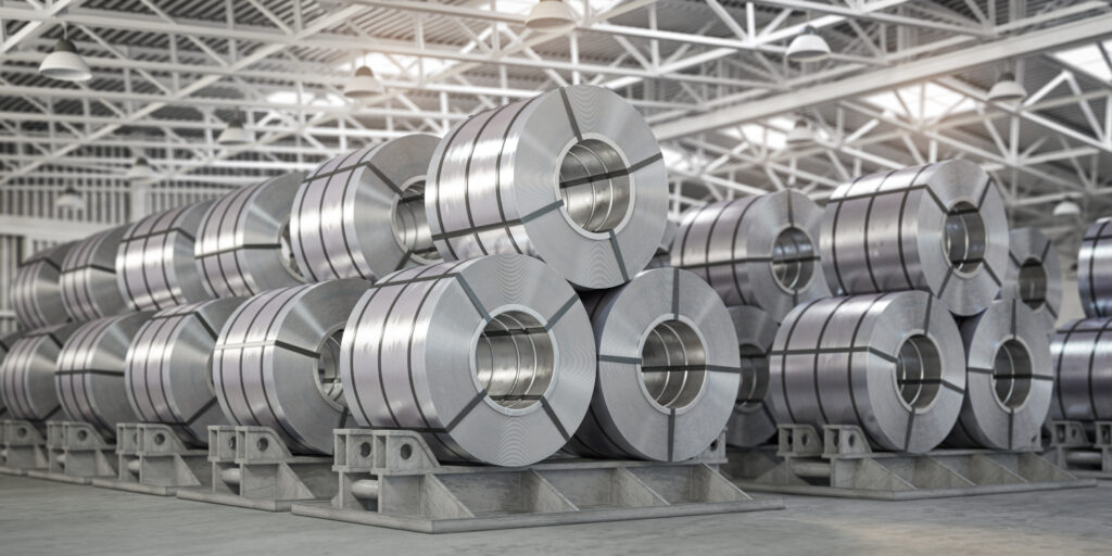 Rolls of aluminium sheet in a warehouse